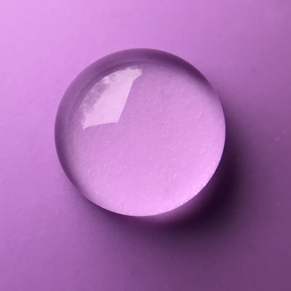 one water drop on purple